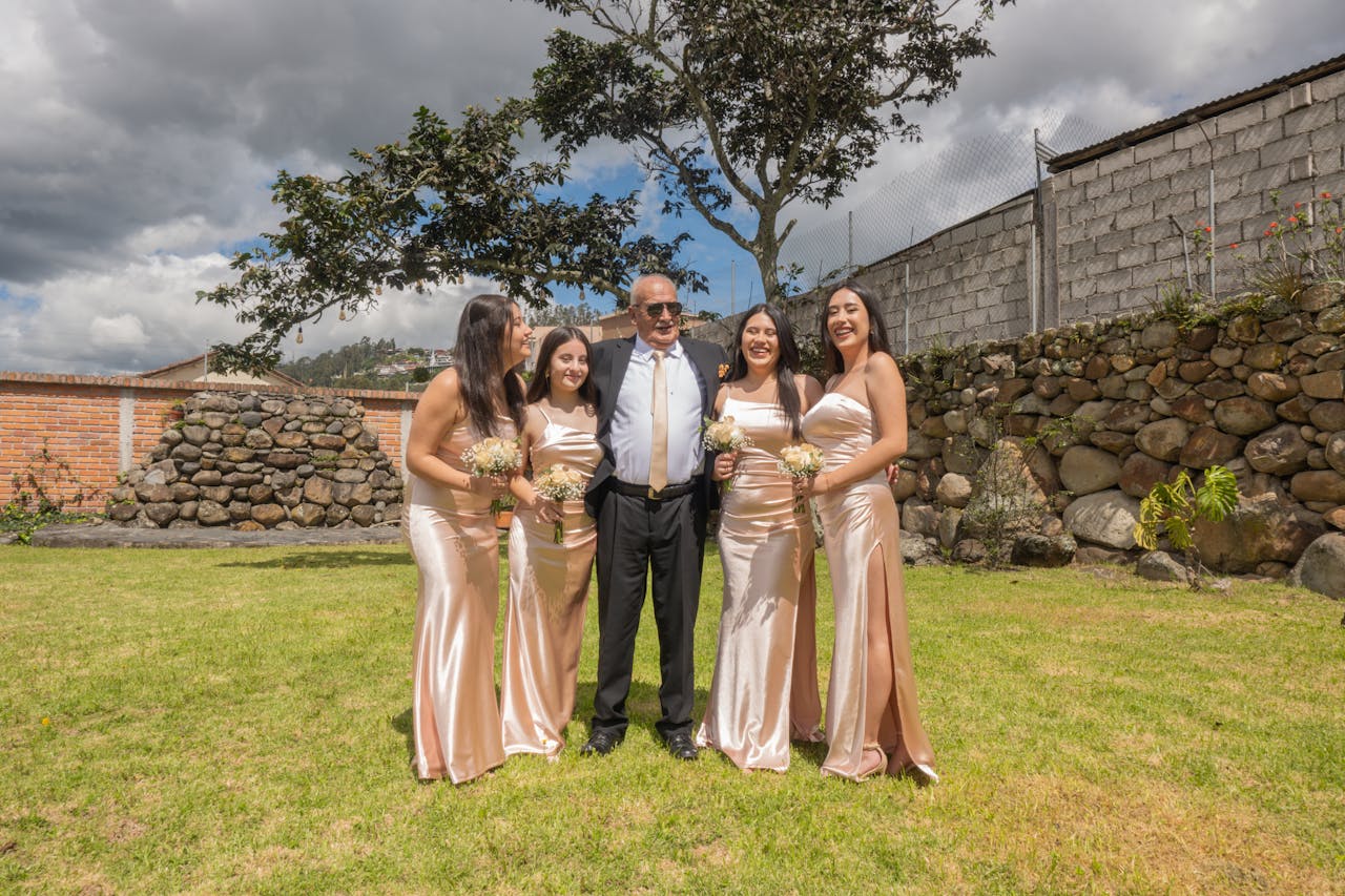 Bride with bridesmaids and guest at a colorful wedding in Cuenca, Ecuador.